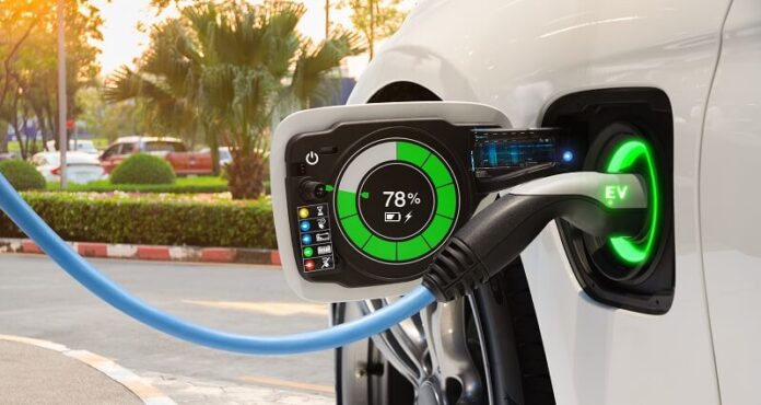 Electric car at charging station