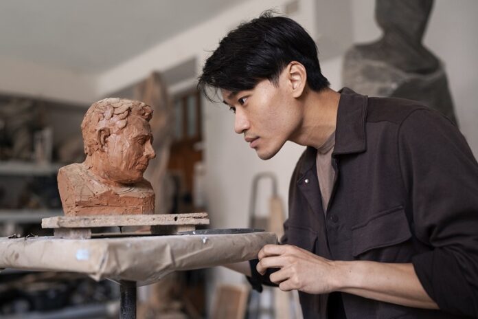 Man Clay Sculpting Medium Shot