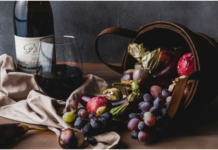 Crushing the Crush: 6 Technologies That Have Changed The Winemaking Industry wine bottle and fruits on the table